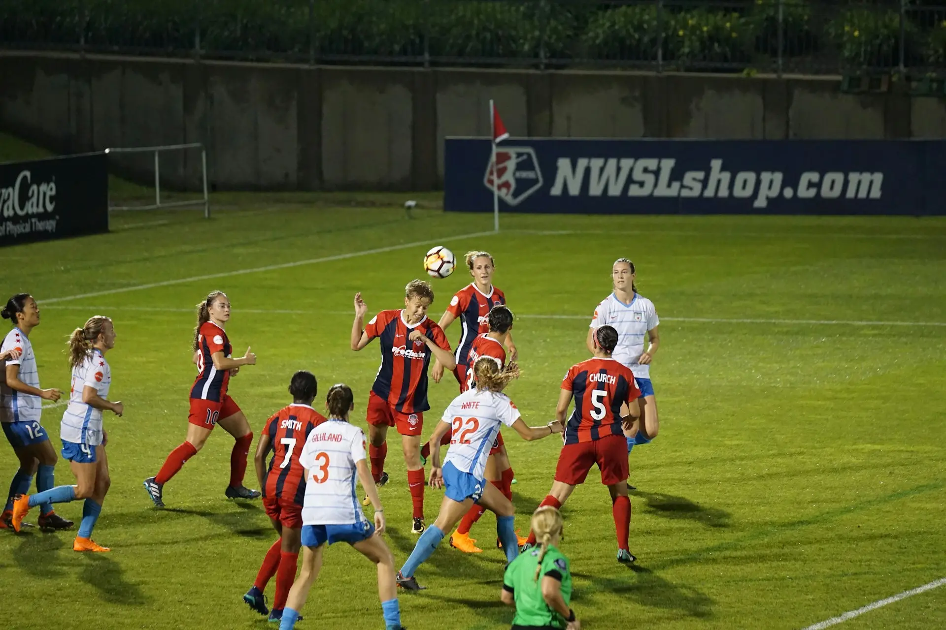 athlete playing soccer on field